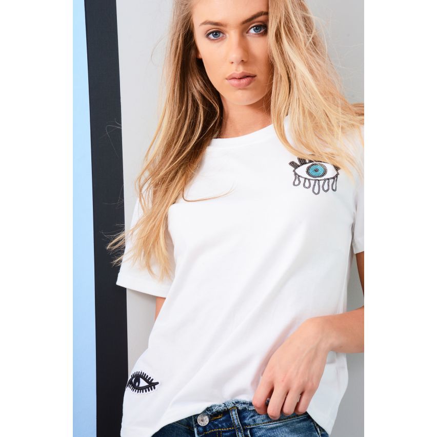 T-shirt blanc Lovemystyle avec paillettes embellissement de globe oculaire