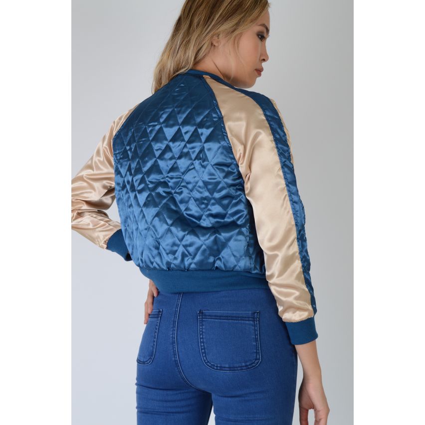 Lovemystyle blau gesteppte Satin Bomber mit rosa Ärmel